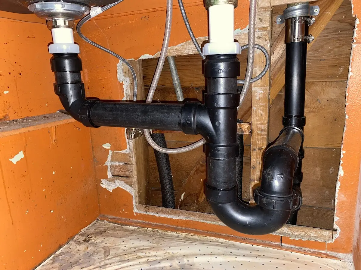 Professional Garbage Disposal Repair equipment and tools on the job in Heidelberg
